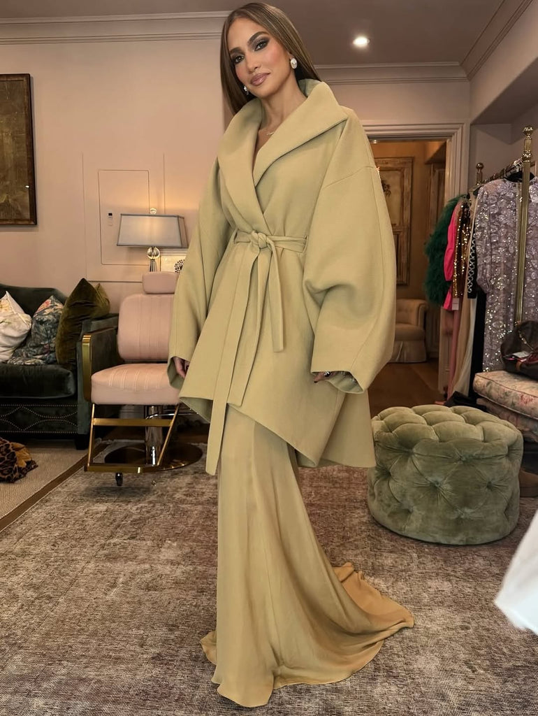 JLO wearing Evangelista coat and skirt from the Harithand La Métamorphose collection for the screening of Kiss of the Spider Woman Film